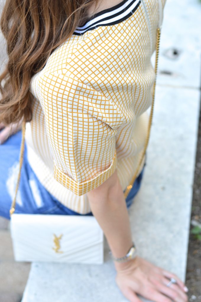 yellow checked boxy top and white cross body bag