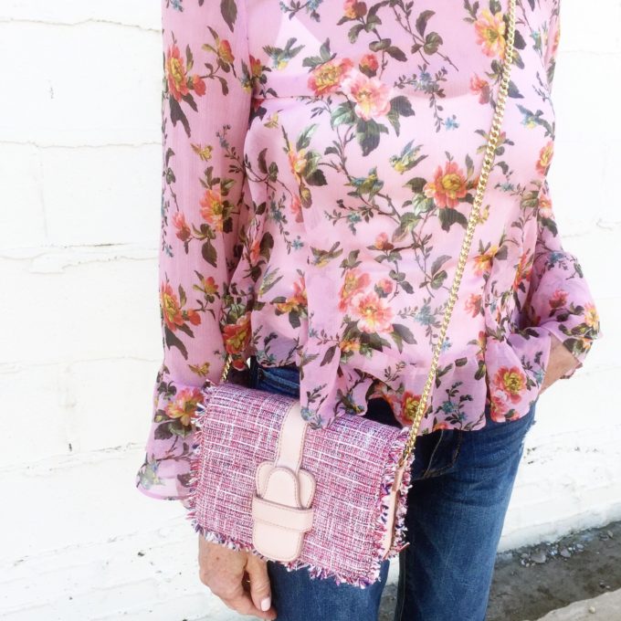 floral ruffle top with coordinating tweed clutch