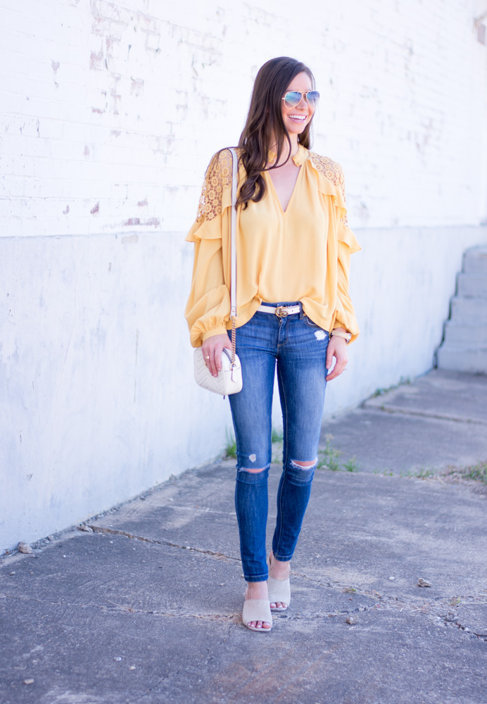 yellow top white belt distressed jeans