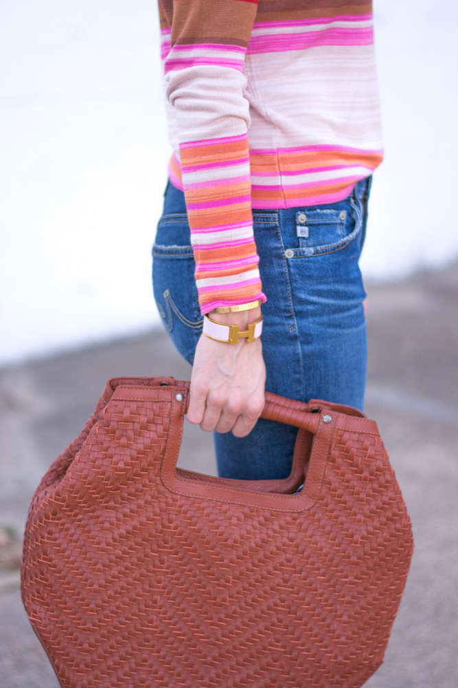 striped sweater brown handbag
