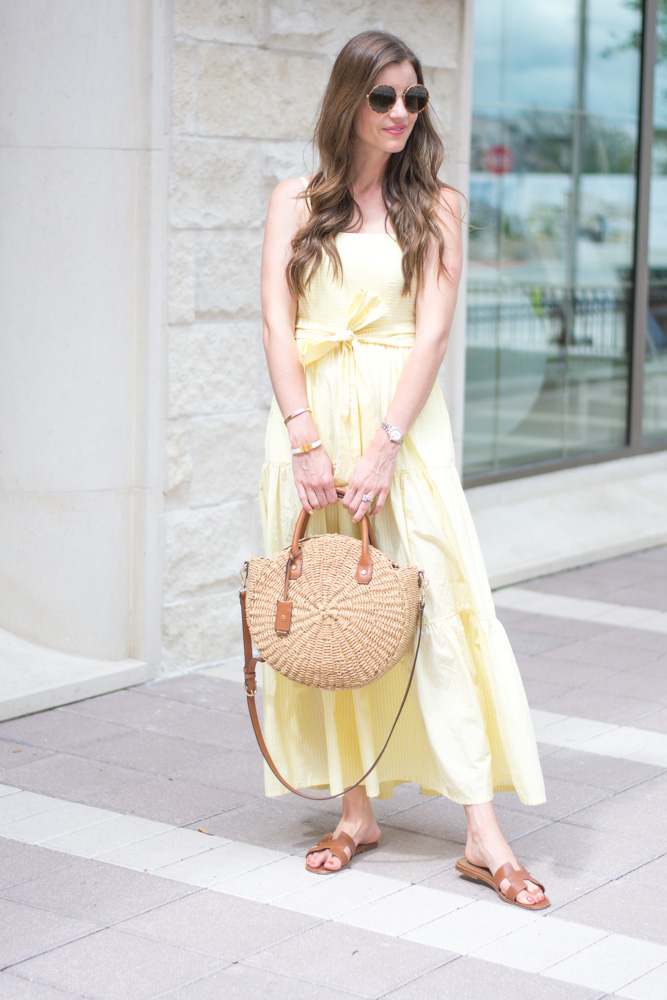 yellow striped maxi dress straw circle bag