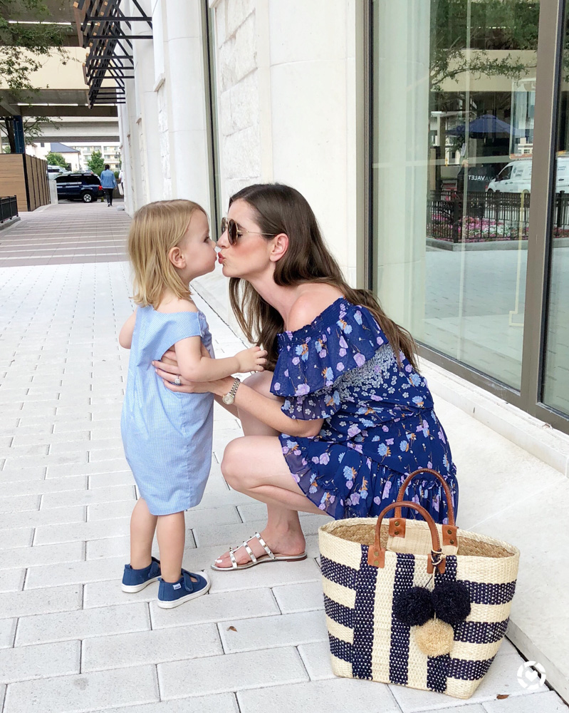 june n review mom kissing toddler