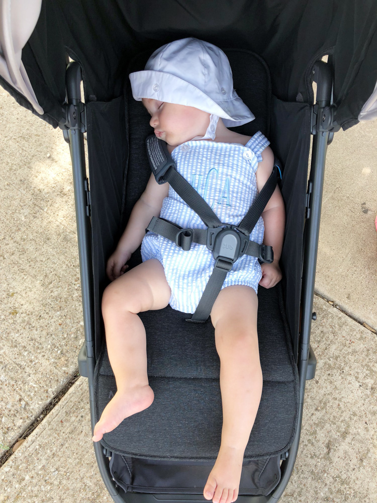 baby boy sleeping in stroller