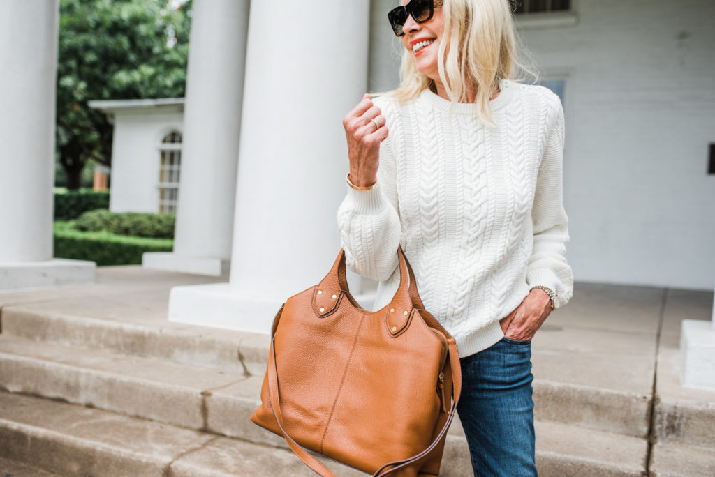 winter white cable knit sweater cognac tote