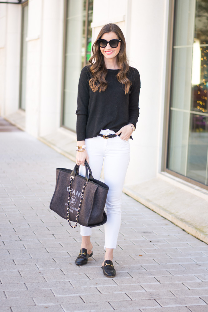 classic black sweater white jeans black loafers