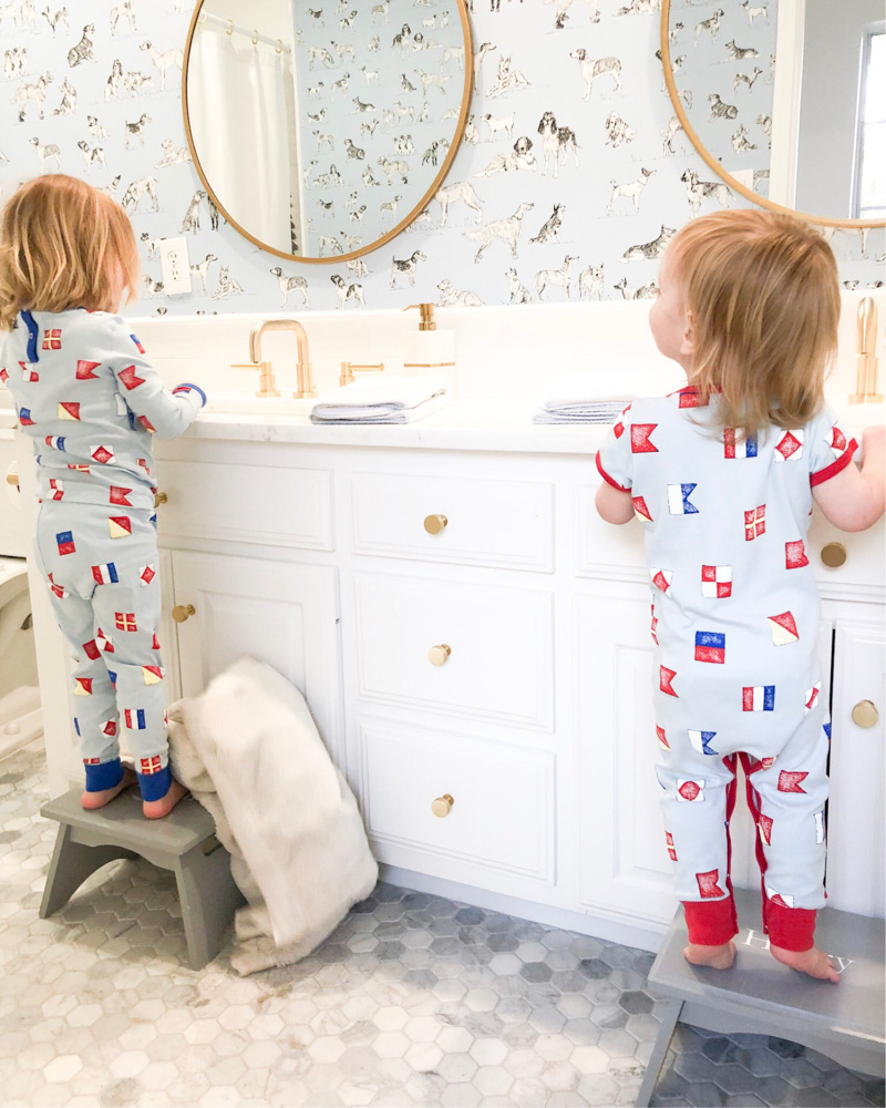 toddler boys brushing teeth at sinks wearing the beaufort bonnet company pajamas