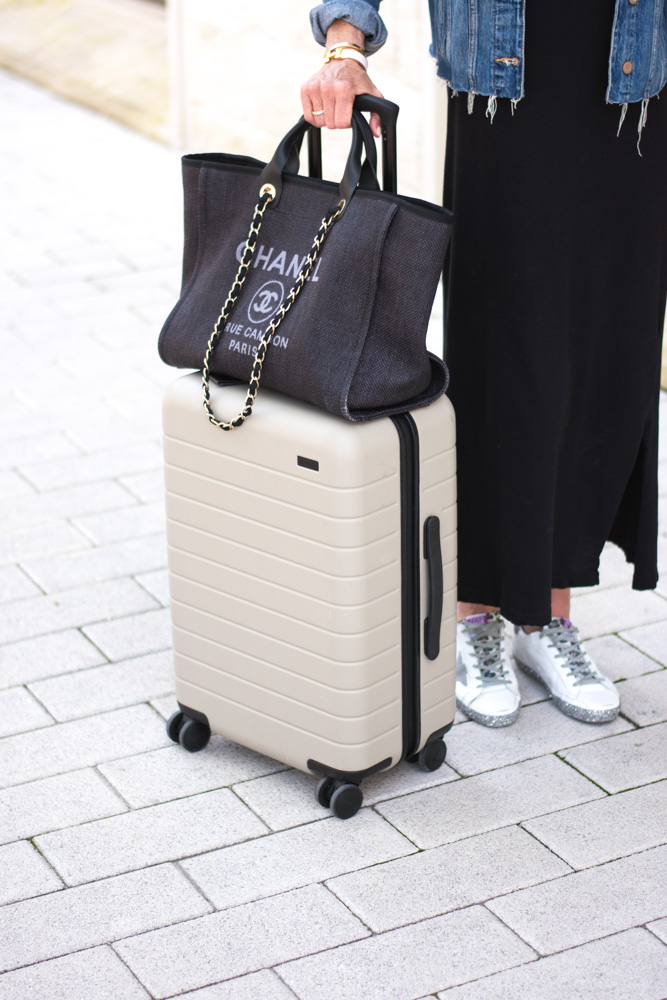 black chanel tote bag tan suitcase
