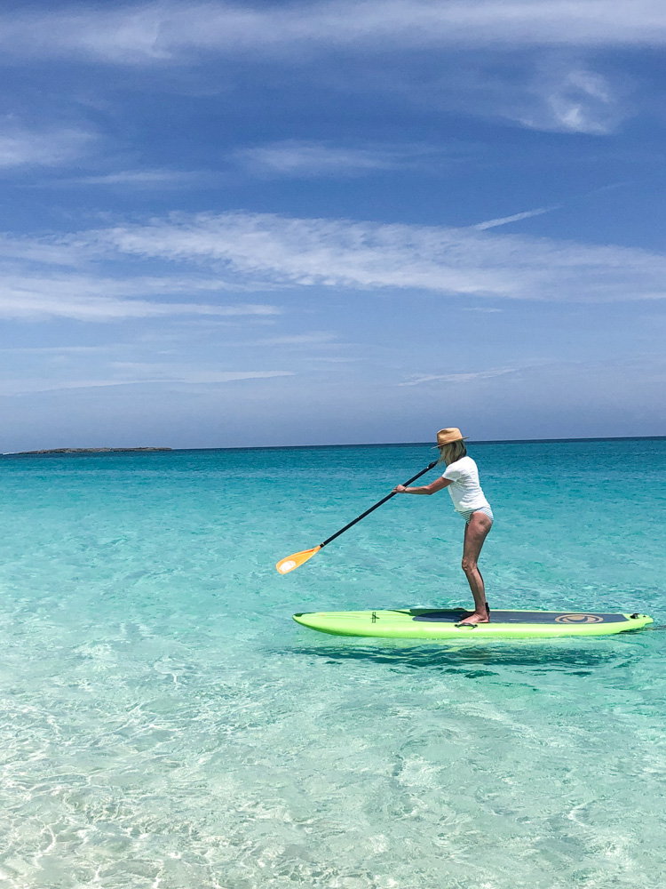 woman paddleboarding