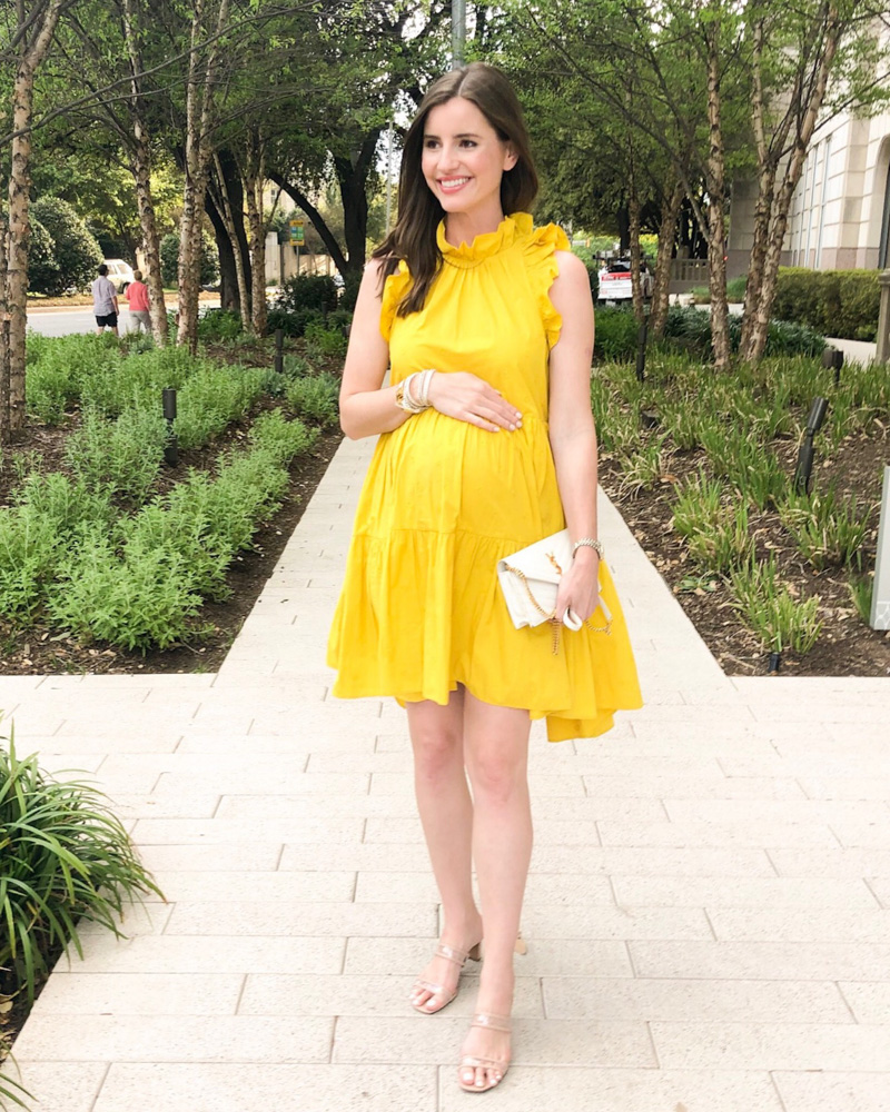 young woman yellow ruffled dress