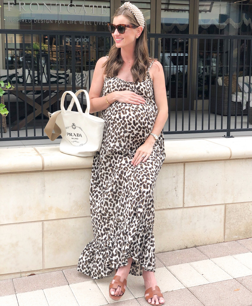 woman wearing leopard print maxi dress