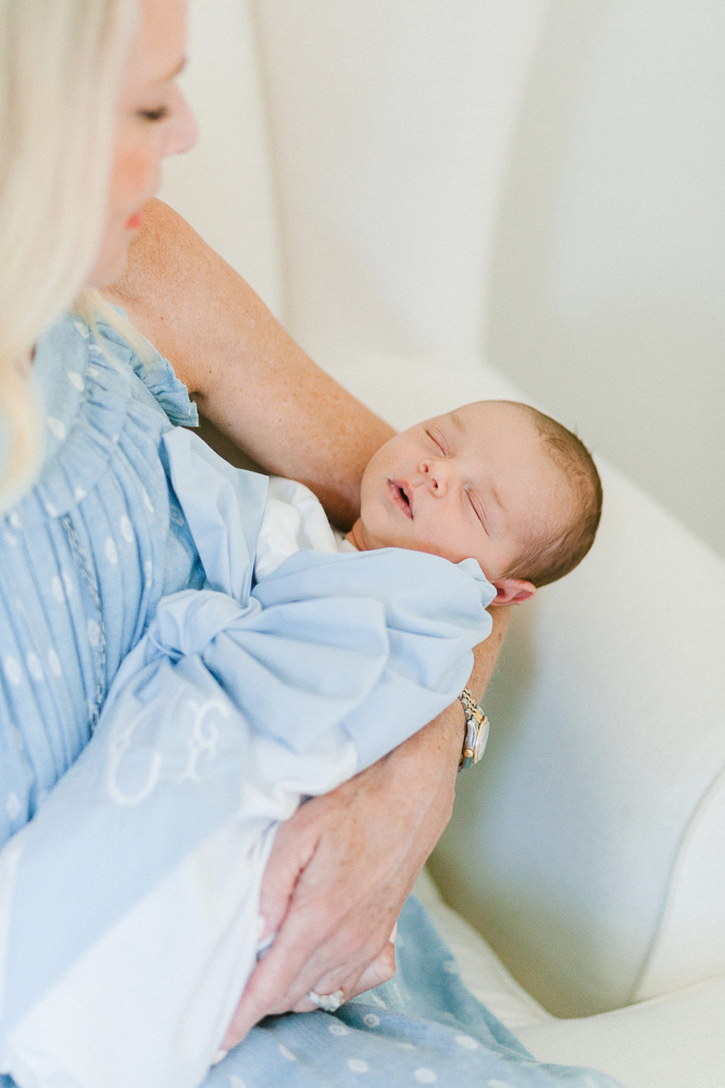 grandmother holding baby