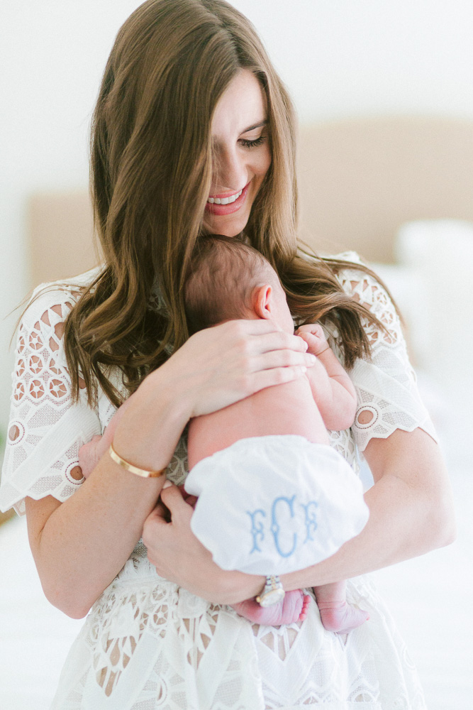 mother holding baby