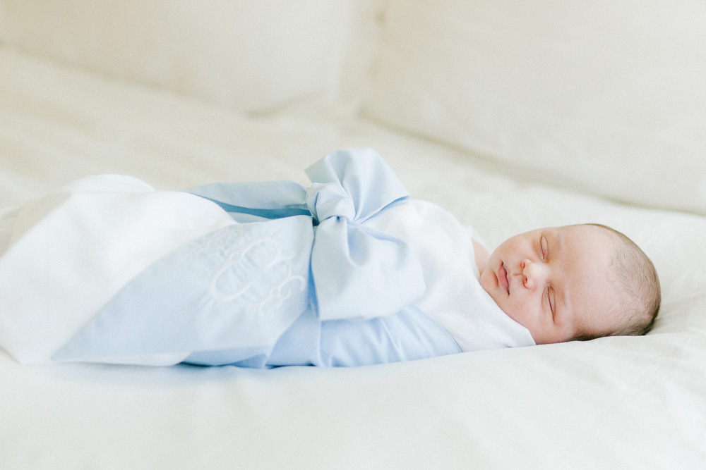 newborn baby swaddled