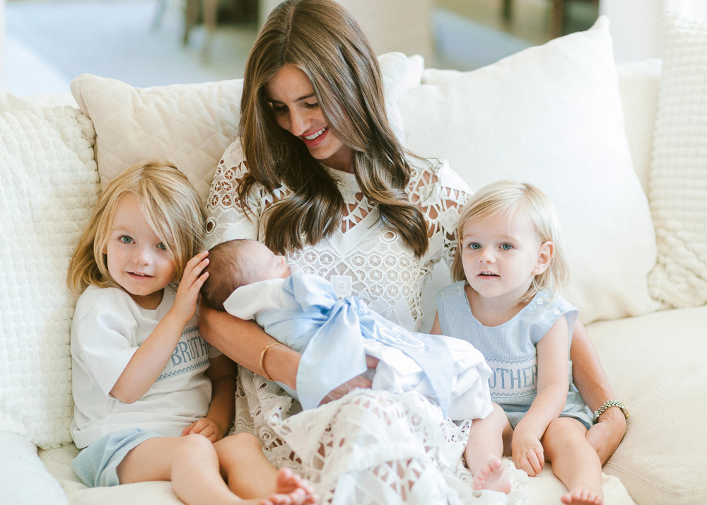 mom with two toddler boys and new baby