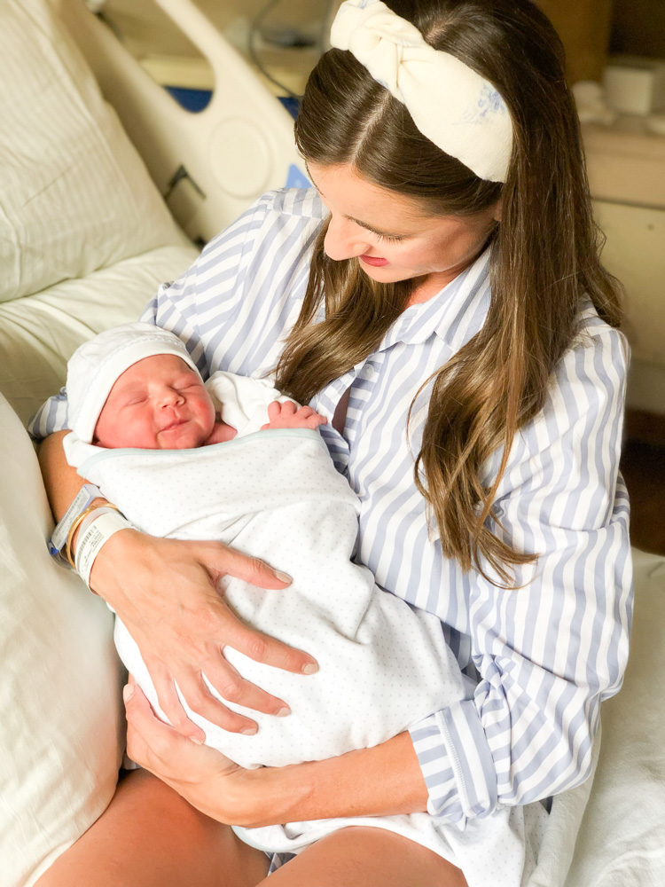 mom holding newborn baby boy