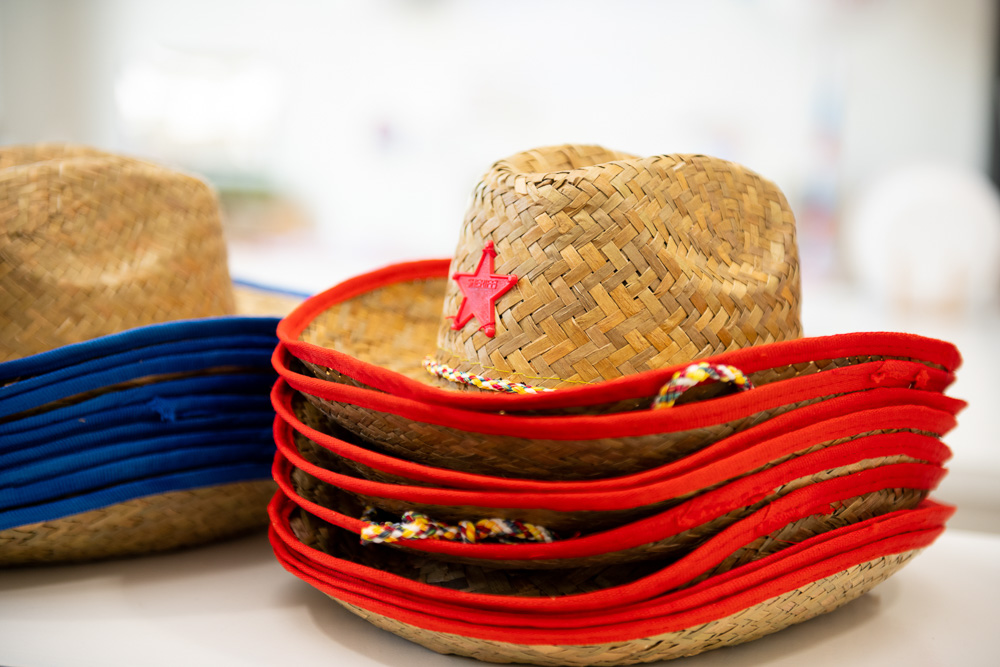 red straw cowboy hat party favors