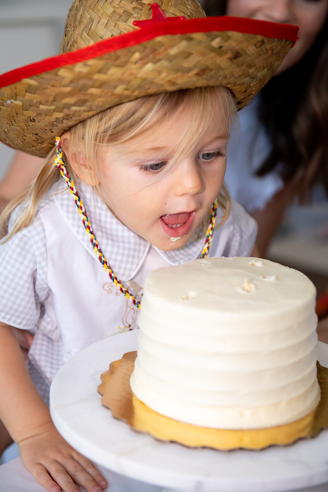 toddler boy with birthday cake