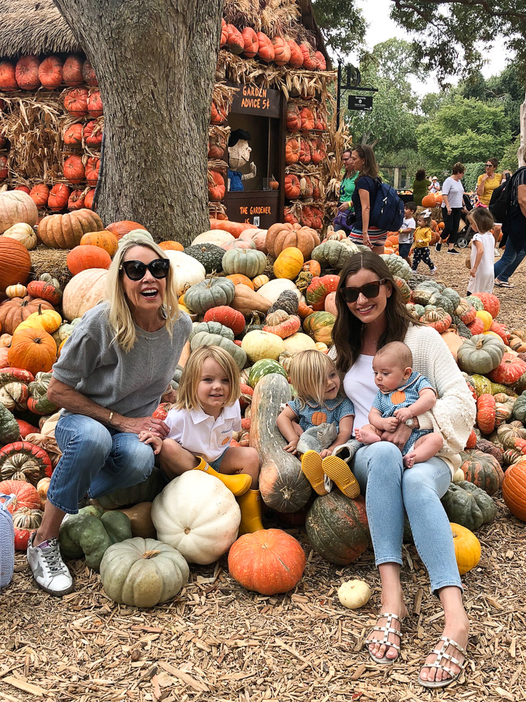 two women with children at pumpkin patch