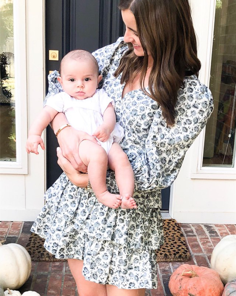 mom holding baby