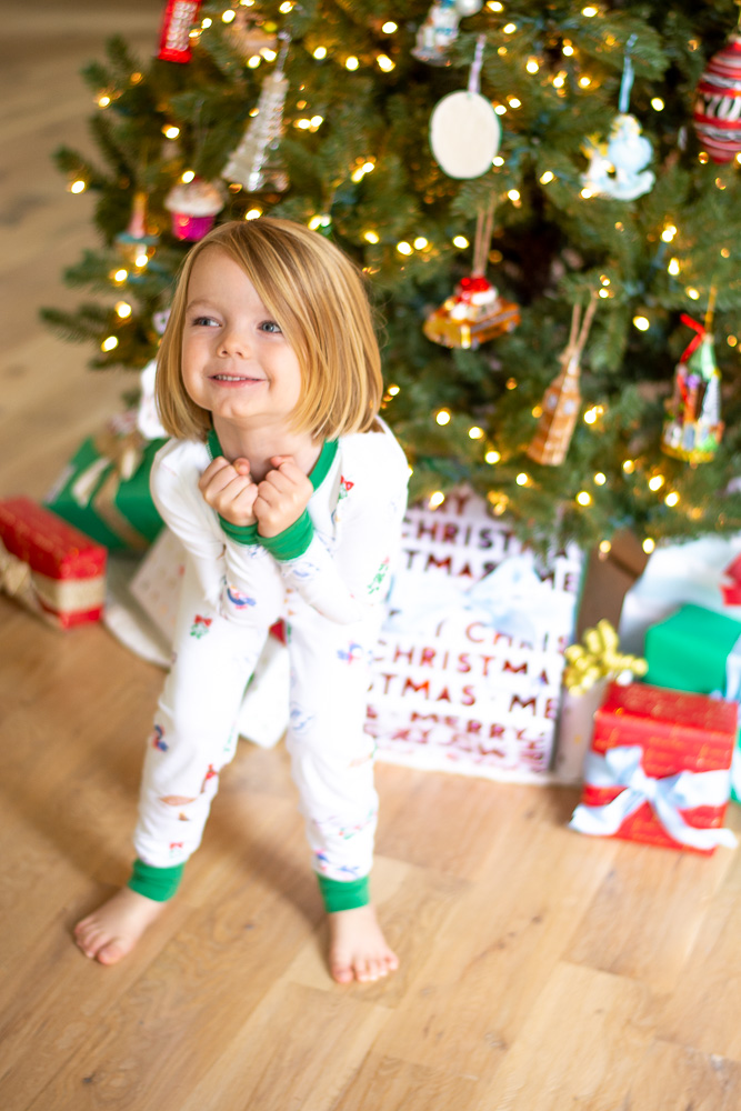 toddler boy in christmas pajamas