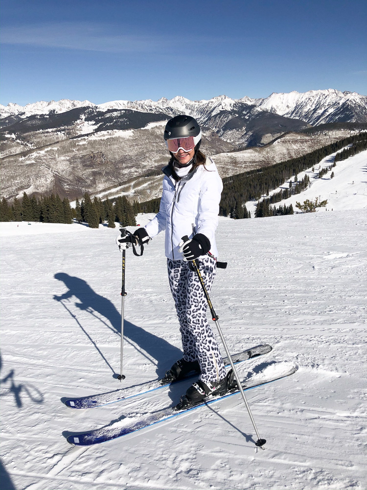 woman skiing on top of vail mountain