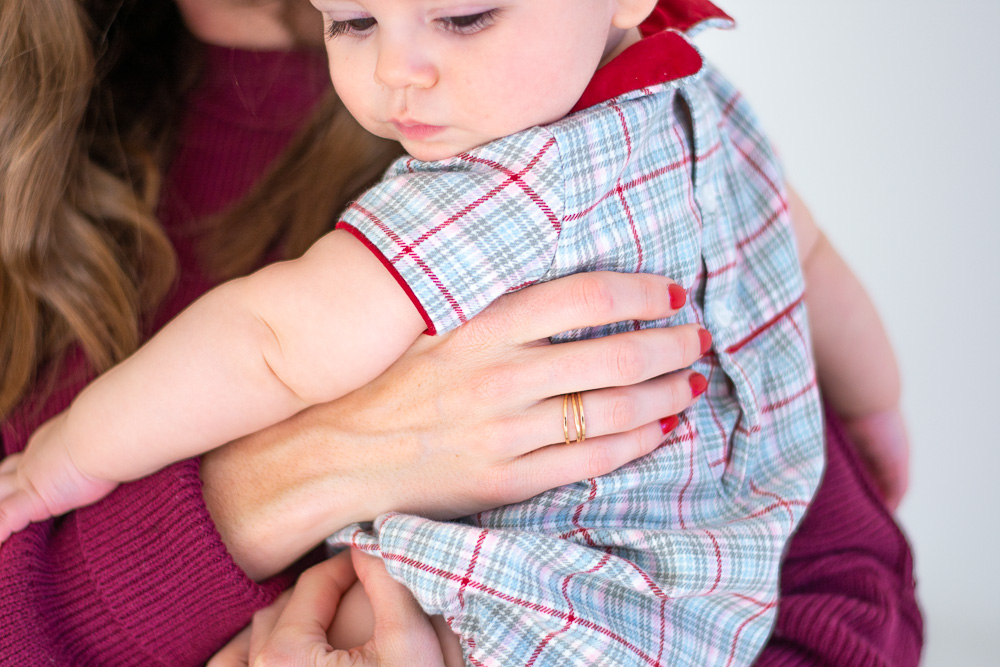 baby boy in plaid bubble