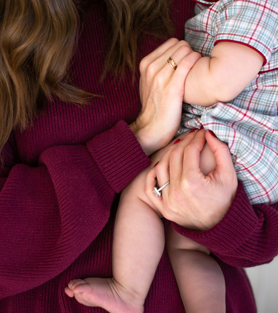 mom holding baby