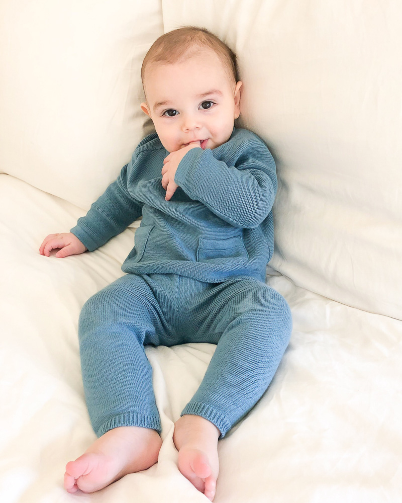 baby boy in blue knit outfit