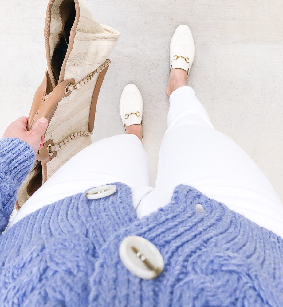 blue sweater white jeans white loafers