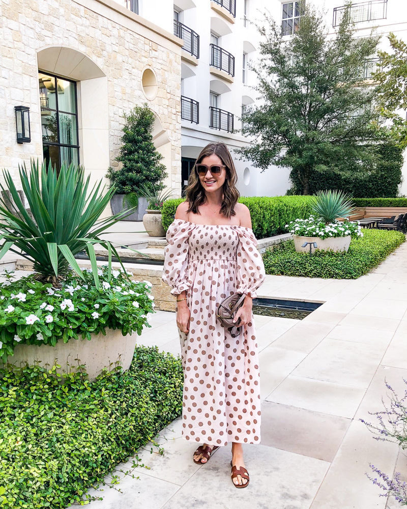 woman in smocked polka dot maxi dress