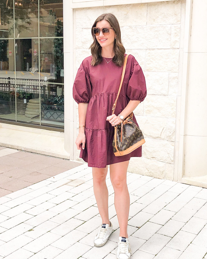 woman in burgundy tiered mini dress