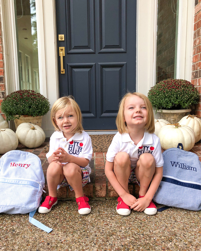 two brothers sitting on porch first day of school