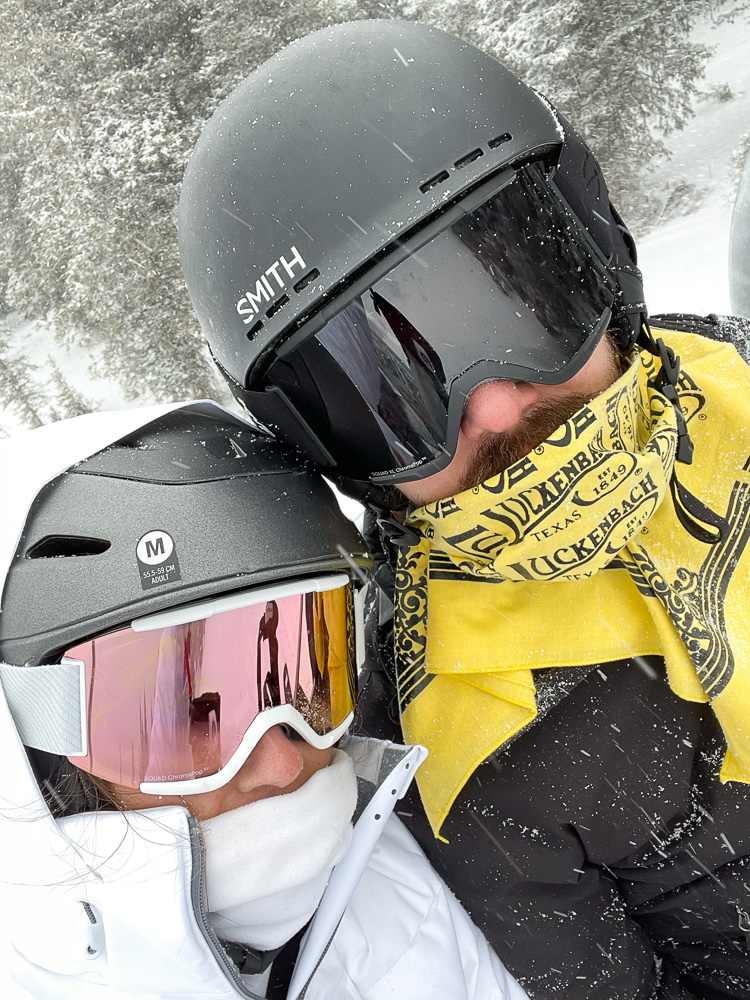 two skiers with helmets and goggles