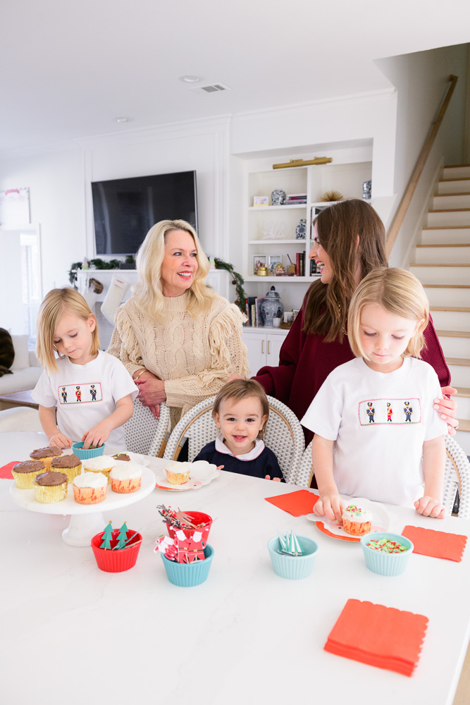 mom grandmother three toddler boys cupcake decorating