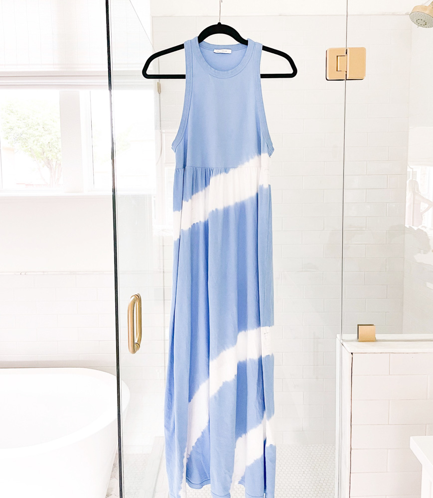 tie dye maxi dress hanging on shower door