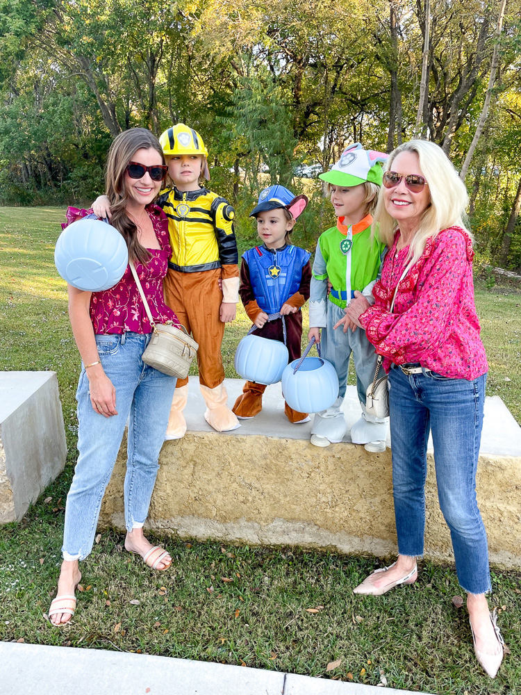two women with three toddler boys in paw patrol costumes