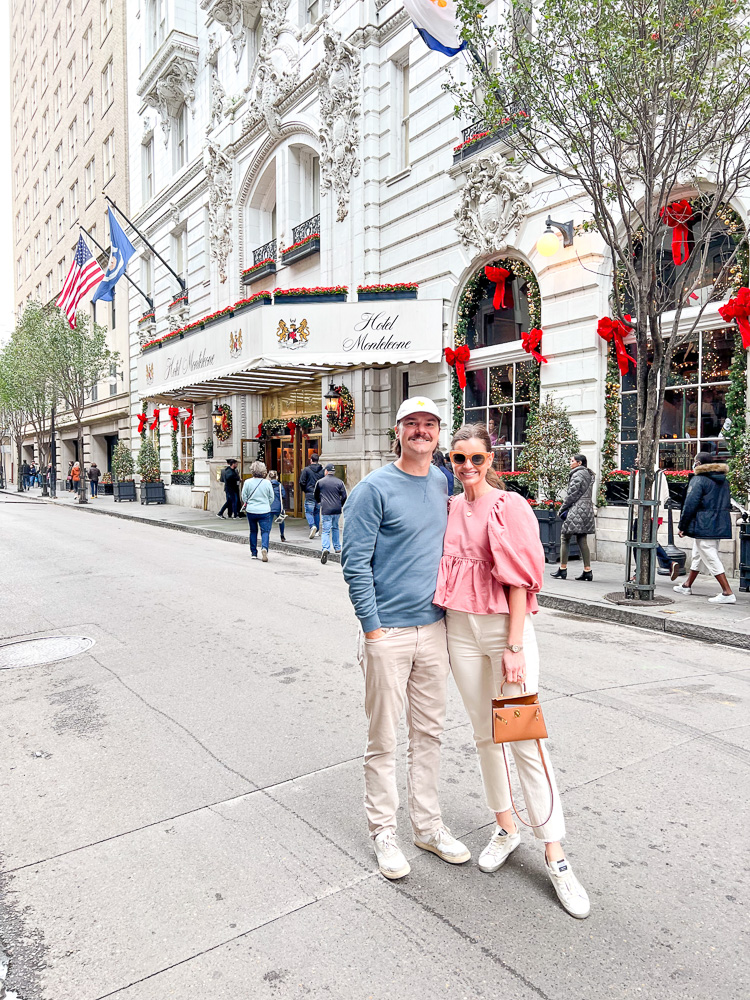 couple standing in front of new orleans hotel