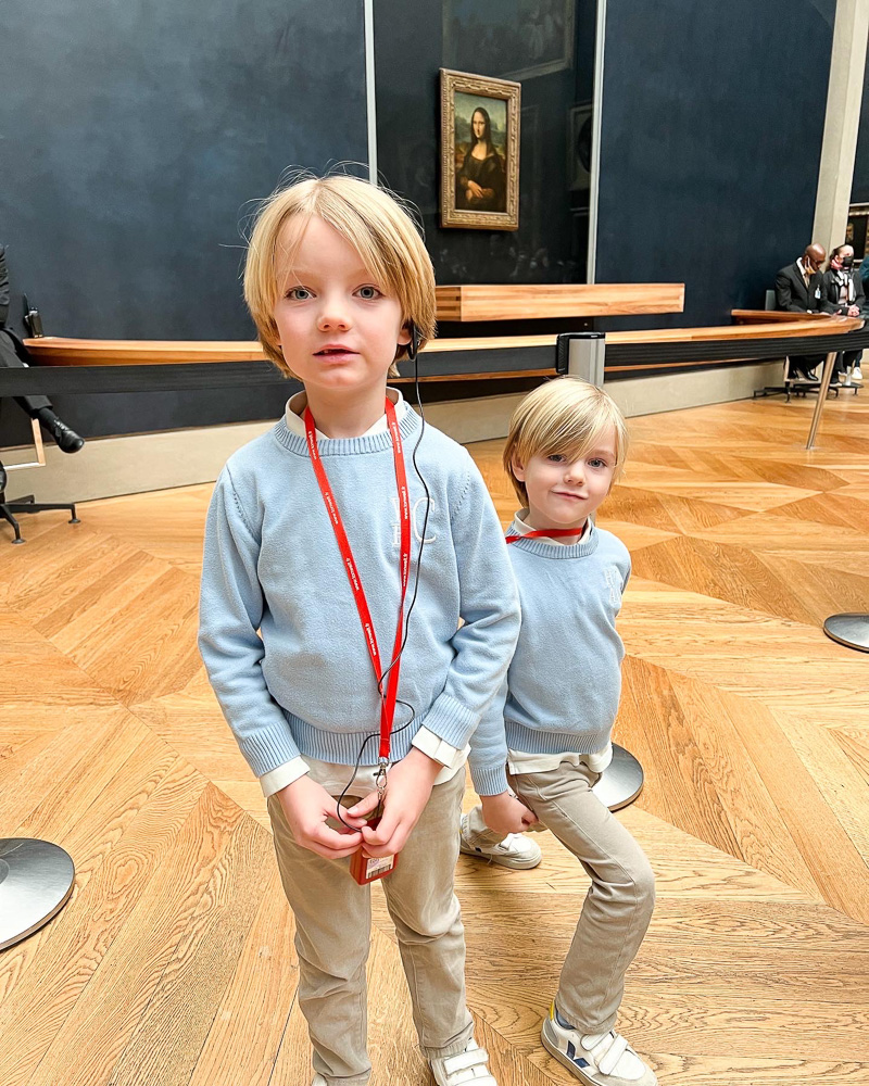 two young boys inside the louvre
