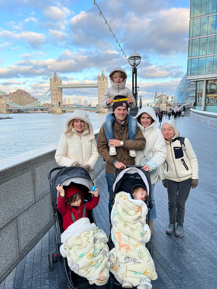 family group southbank london view of tower bridge