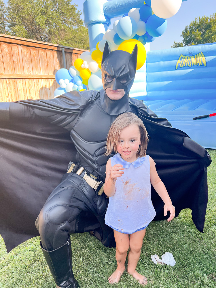 batman with toddler boy