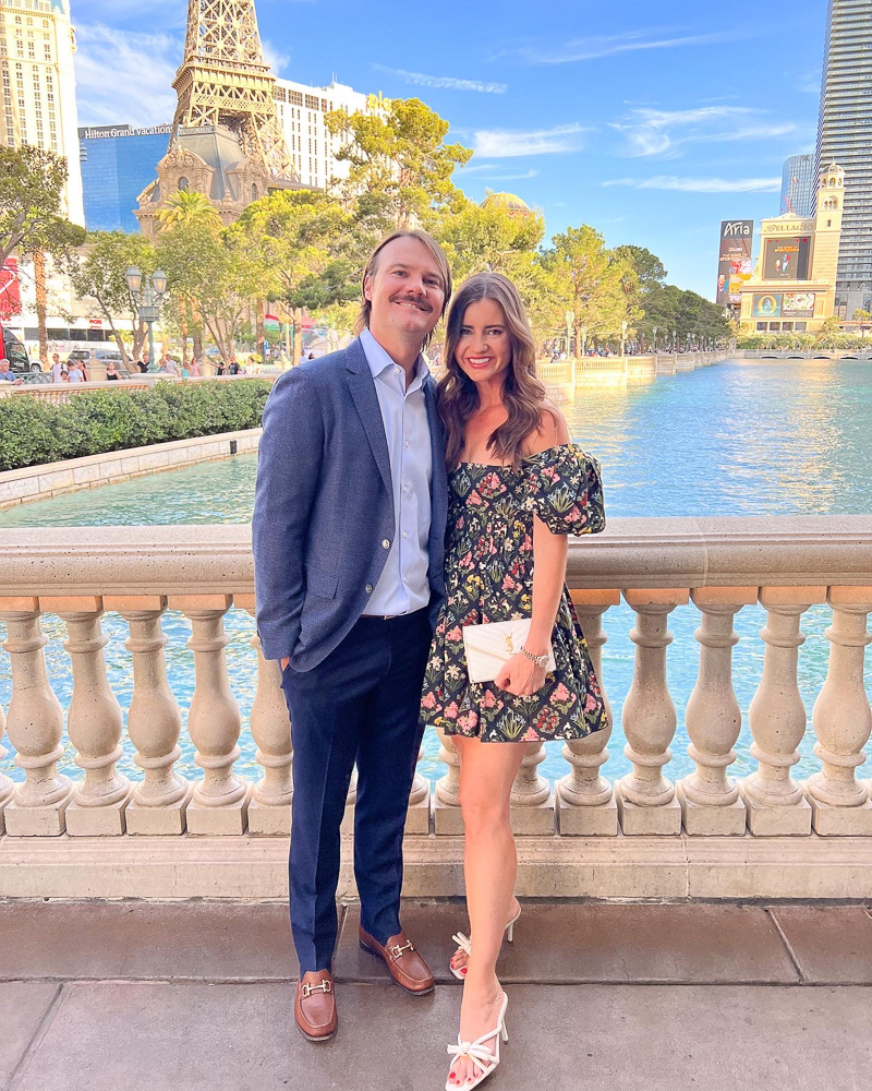 couple standing in front of bellagio fountain las vegas