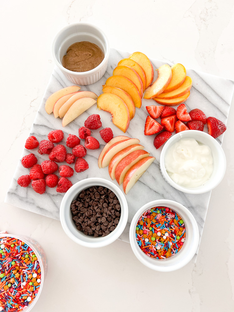 snack board fruit yogurt sprinkles peanut butter