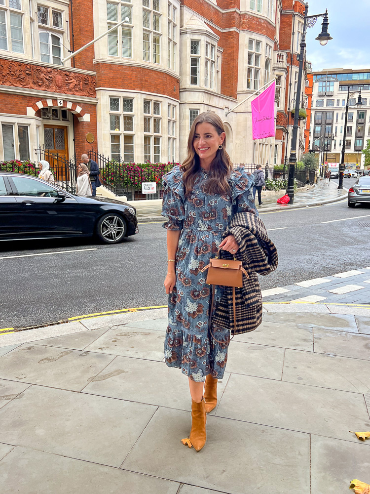woman in floral dress on the street london