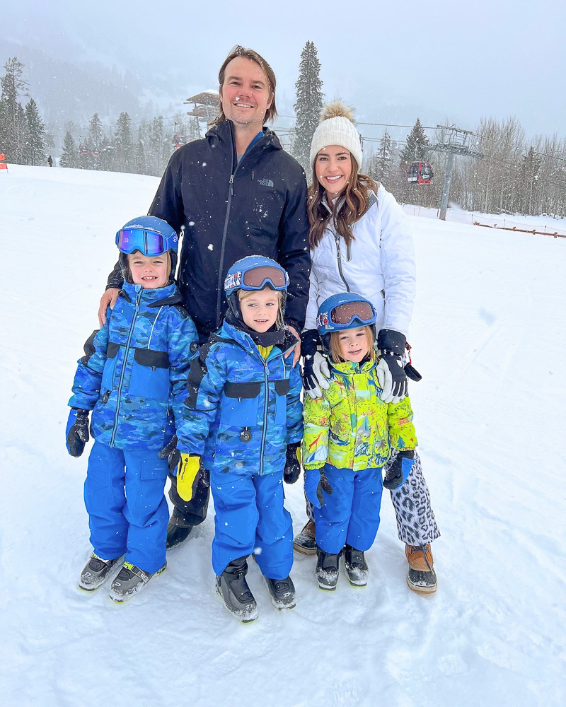 family group standing on the ski slope teton village WY