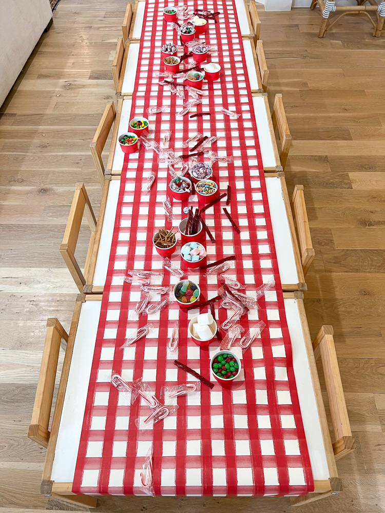 kids table decorated with red gingham table runner