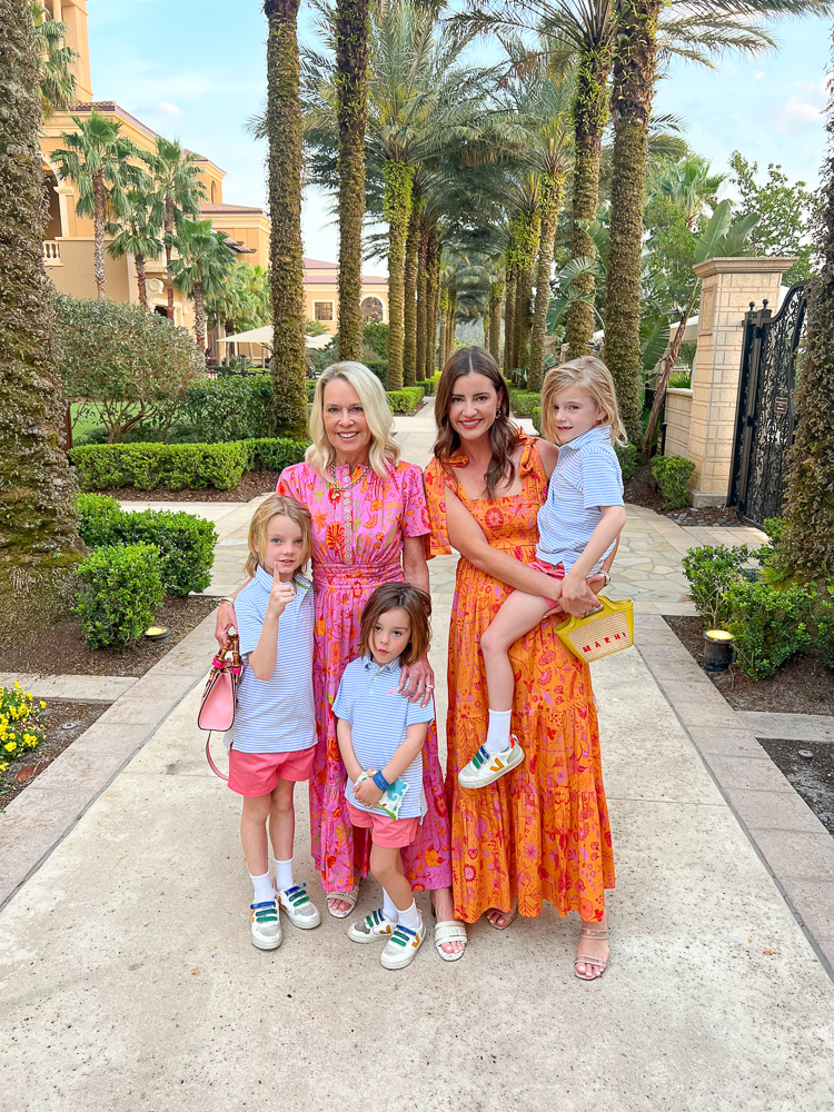 two women and three little boys heading to dinner four seasons orlando