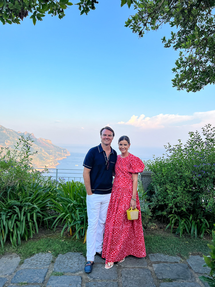 couple standing with view out to the ocean ravello