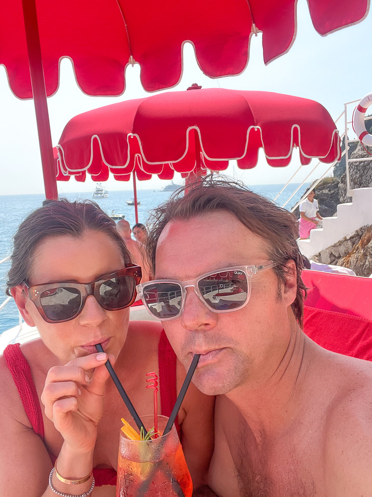 couple sipping spritz together palazzo avino beach club