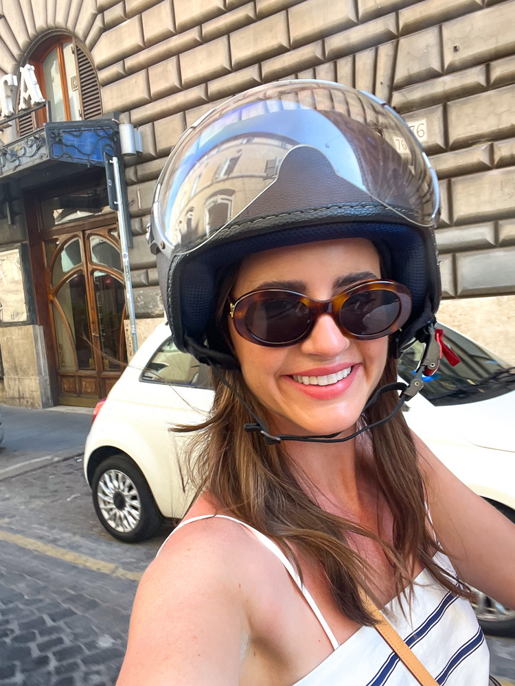 woman in bike helmet in rome