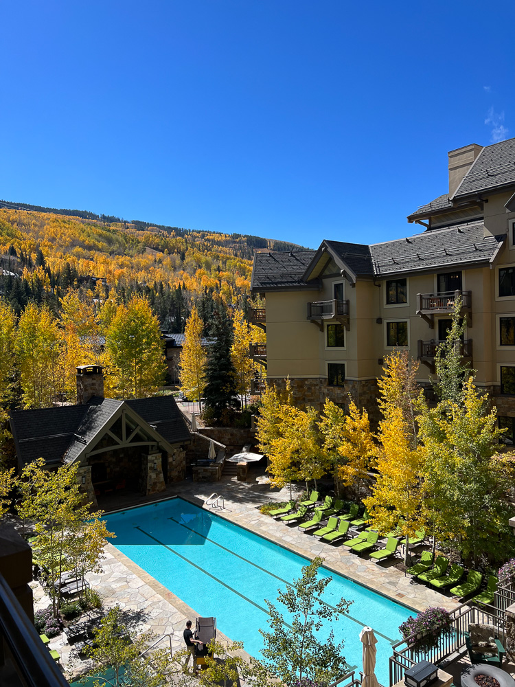 view of hotal pool from upper balcony four seasons vail